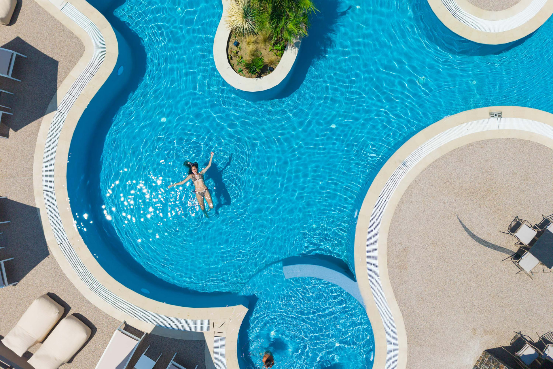 anese — aerial view, floating in the pool